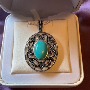 Turquoise and silver pendant with chain